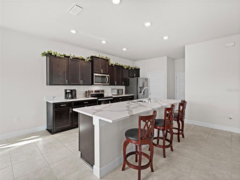 Furnished interior view inside a new home in , Palm Bay (Image 11). Furnished interior view inside a new home in , Palm Bay (Image 11).