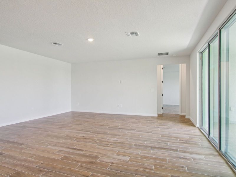 Spacious, unfurnished interior of a new home in Oakfield Trails - Signature Series, Parrish (Image 11). Spacious, unfurnished interior of a new home in Oakfield Trails - Signature Series, Parrish (Image 11).
