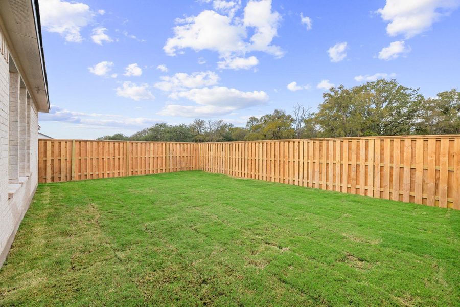 Exterior details and patio area of a home in Parmer Ranch - 40', Georgetown (Image 4). Exterior details and patio area of a home in Parmer Ranch - 40', Georgetown (Image 4).