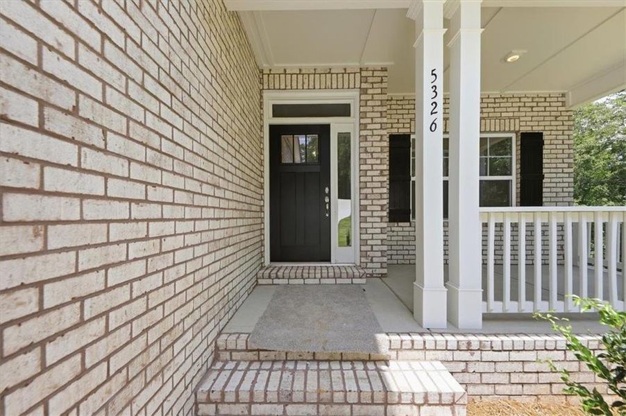 Exterior details and patio area of a home in Tuscany Hills, Douglasville (Image 24).