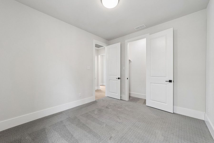 Representative unfurnished interior of a home built from the Kindrick by Landon Homes in Fields - East Village, Frisco (Image 34). Representative unfurnished interior of a home built from the Kindrick by Landon Homes in Fields - East Village, Frisco (Image 34).