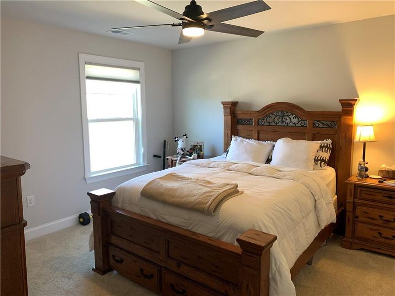 Furnished interior view inside a new home in Holiday Pines, Buford (Image 10).