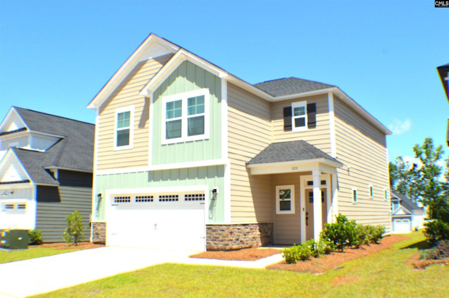 Front exterior of a new home in Bickley Station, Irmo, SC, highlighting curb appeal (Image 2). Front exterior of a new home in Bickley Station, Irmo, SC, highlighting curb appeal (Image 2).