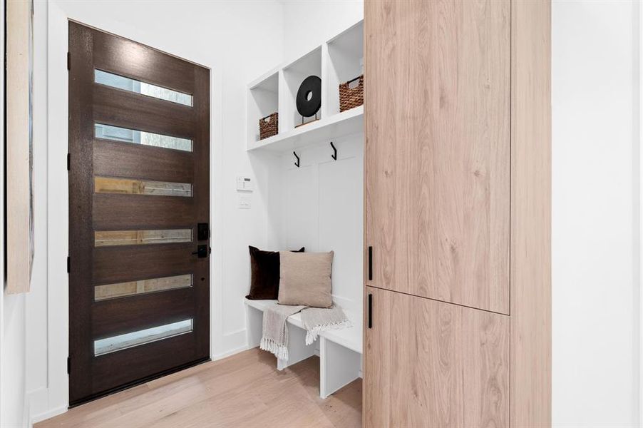 Mudroom with storage as you enter the home.