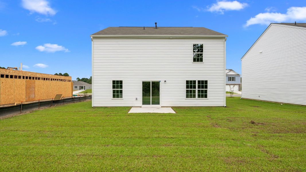 Front exterior of a new home in Madeline Farm, New Bern, NC, highlighting curb appeal (Image 17).