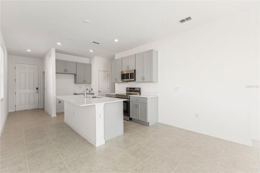 Furnished interior view inside a new home in Liberty Station, Orange City (Image 3).