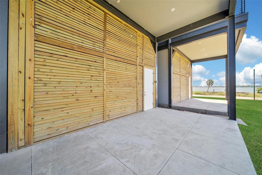 Exterior details and patio area of a home in Lago Pointe, Seabrook (Image 4).