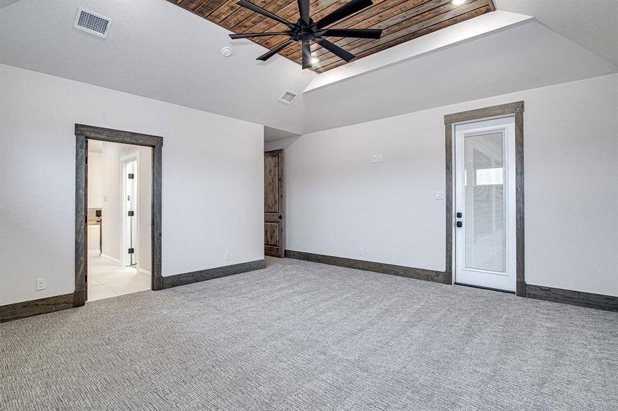 Primary/Master Bedroom with Ensuite Bath and access to back patio Primary/Master Bedroom with Ensuite Bath and access to back patio