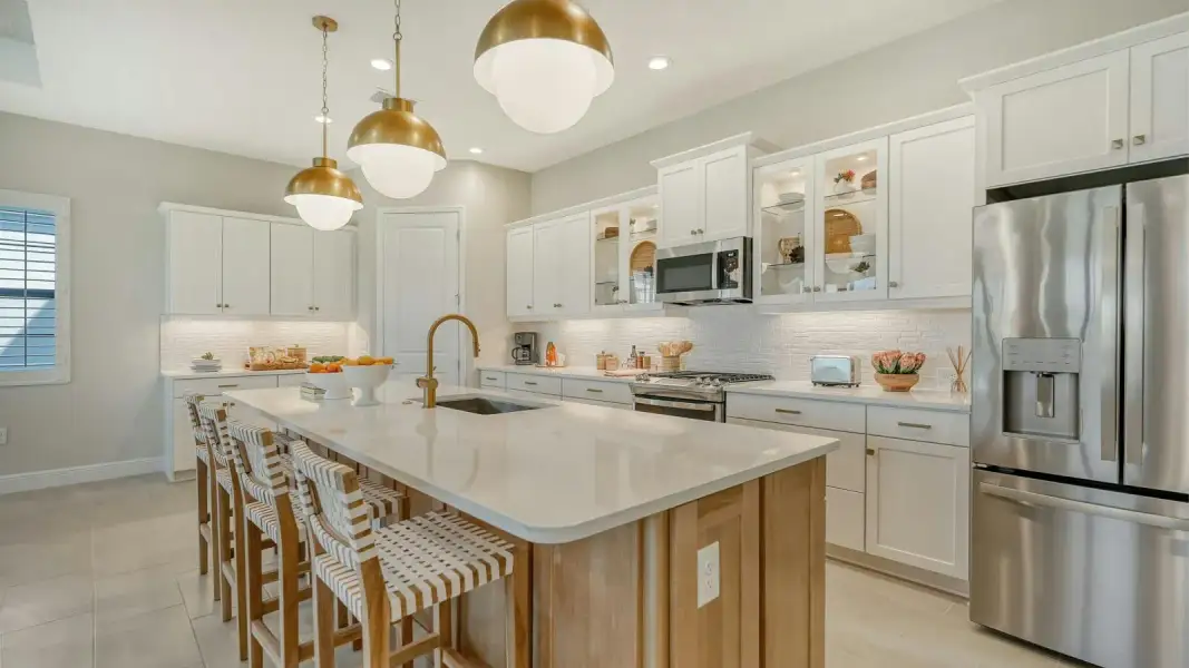 Furnished interior view inside a new home in Kingston South Real Estate and Homes for Sale in Estero, FL - Neal Communities, Estero (Image 13).