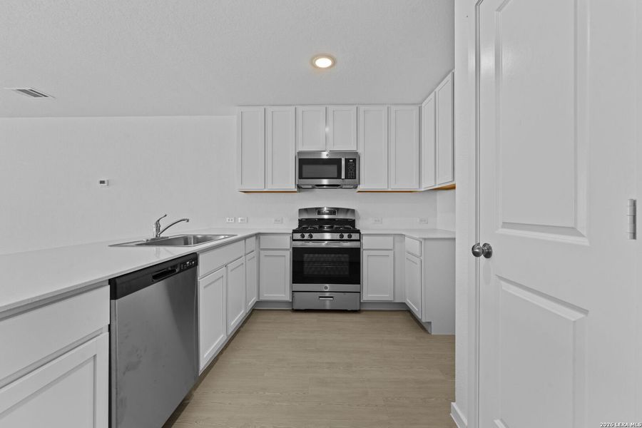 Furnished interior view inside a new home in Waterwheel, San Antonio (Image 6).