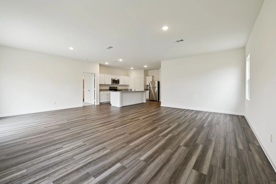 Representative unfurnished interior of a home built from the Firefly by Starlight Homes in Cottonwood Creek, San Marcos (Image 13).