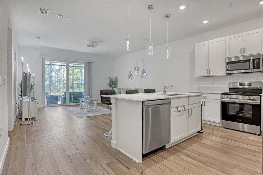 Furnished interior view inside a new home in The Timbers at Everlands, Palm Bay (Image 17).