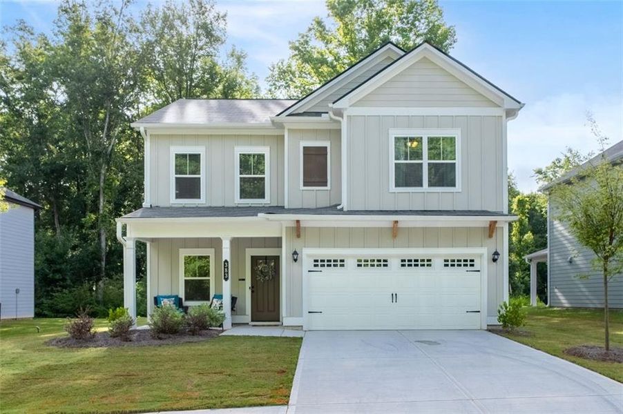 Front exterior of a new home in Morgan Landing, Carrollton, GA, highlighting curb appeal (Image 1). Front exterior of a new home in Morgan Landing, Carrollton, GA, highlighting curb appeal (Image 1).