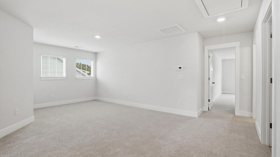 Furnished interior view inside a new home in Village at Midway, Anderson (Image 25).