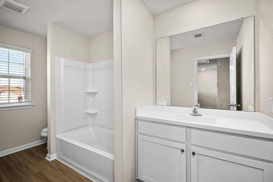 Bathroom #2 with a tub and shower combo.