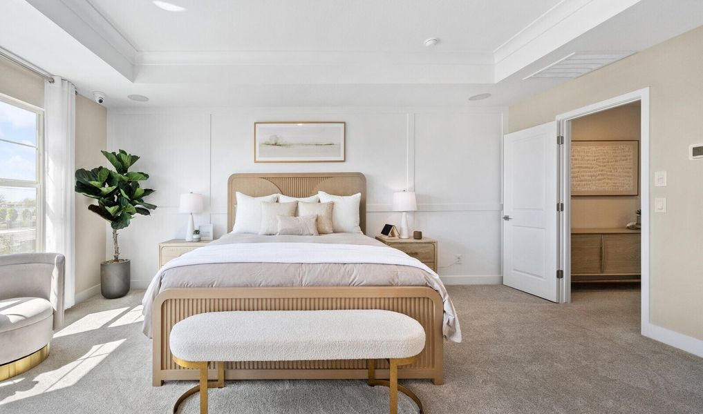 Primary suite with decorative feature wall