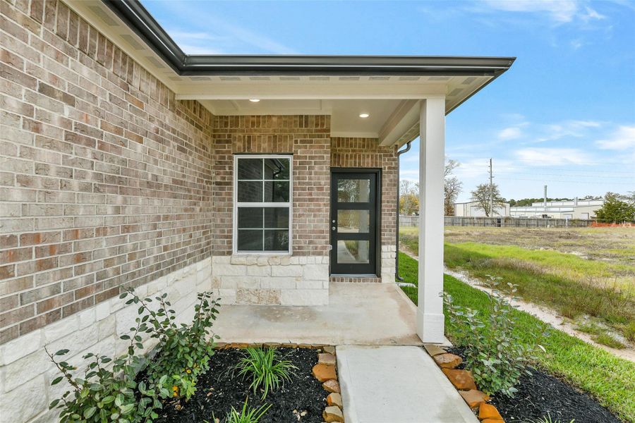 Exterior details and patio area of a home in Windmill Estates, Magnolia (Image 29). Exterior details and patio area of a home in Windmill Estates, Magnolia (Image 29).