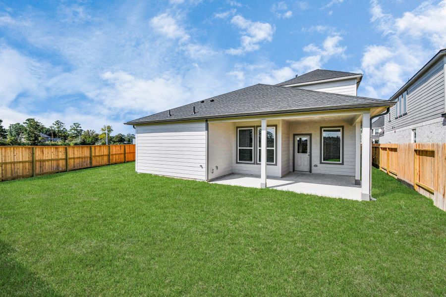 Experience outdoor living at its finest on this expansive covered patio, thoughtfully designed for BBQs and delightful outdoor dining. Sample photo of completed home with similar floor plan. Actual colors and selections may vary. Experience outdoor living at its finest on this expansive covered patio, thoughtfully designed for BBQs and delightful outdoor dining. Sample photo of completed home with similar floor plan. Actual colors and selections may vary.