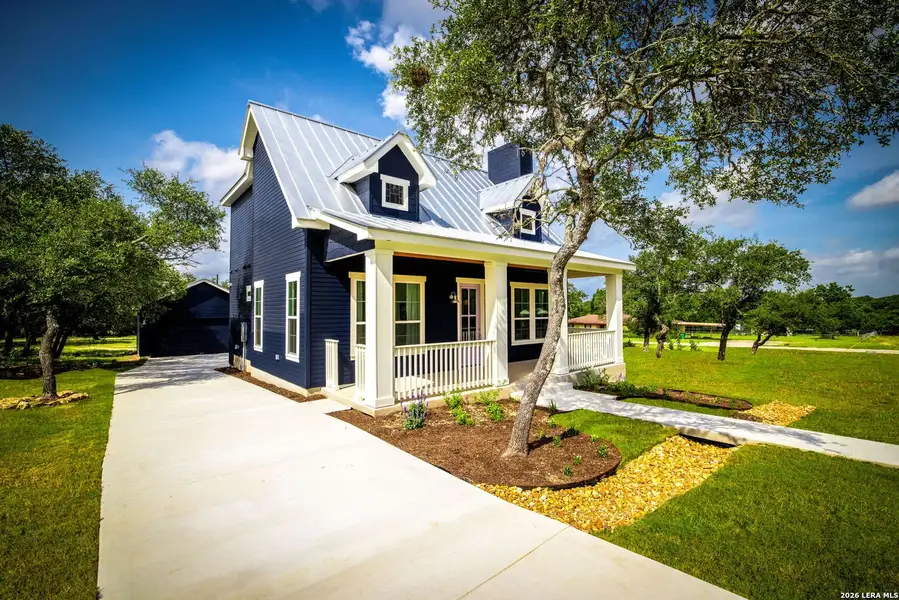 Front exterior of a new home in , Blanco, TX, highlighting curb appeal (Image 31). Front exterior of a new home in , Blanco, TX, highlighting curb appeal (Image 31).