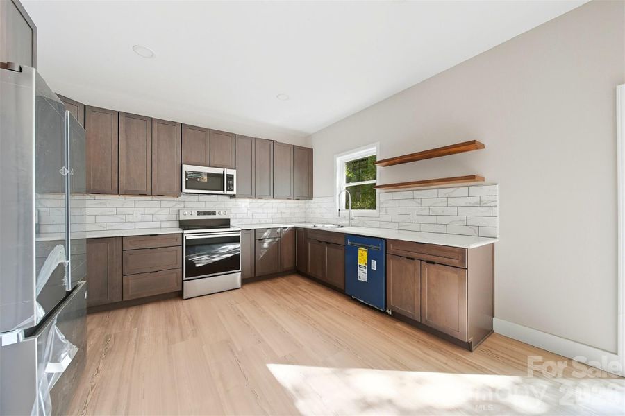 Furnished interior view inside a new home in , Taylorsville (Image 7).