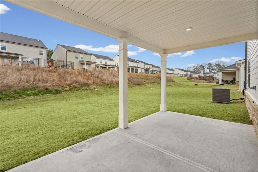 Exterior details and patio area of a home in Twin Lakes, Hoschton (Image 27).