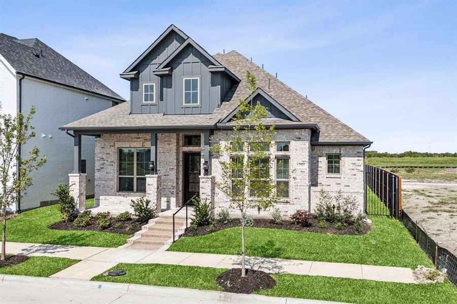 Front exterior of a new home in Talia, Mesquite, TX, highlighting curb appeal (Image 21).