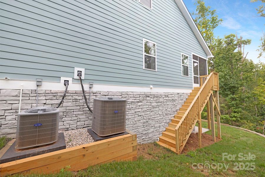 Front exterior of a new home in Edgewater - The Cottages, Lancaster, SC, highlighting curb appeal (Image 1).