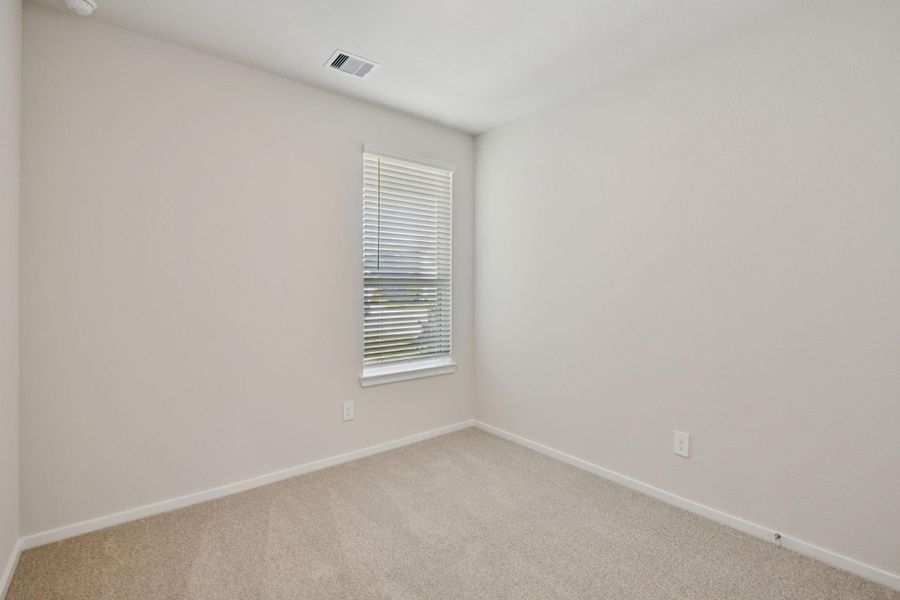 Spacious, unfurnished interior of a new home in Sanford Farms - Traditional Series, Waller (Image 34).