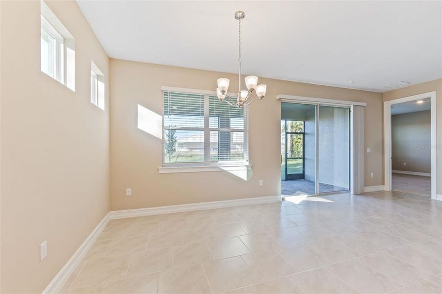 Spacious, unfurnished interior of a new home in Deep Creek Tradition Series, Punta Gorda (Image 13).