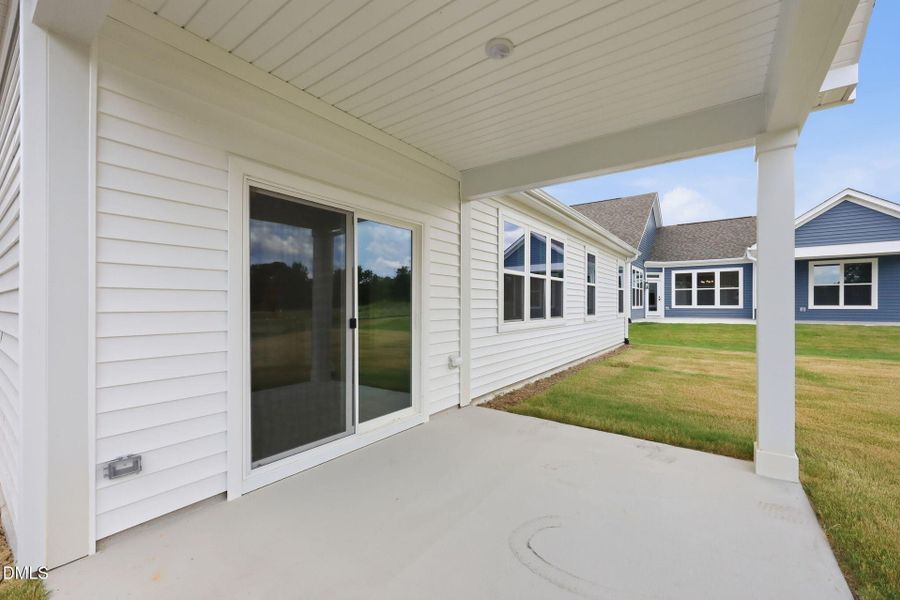 Exterior details and patio area of a home in The Cottages at 78 North, Sanford (Image 26).