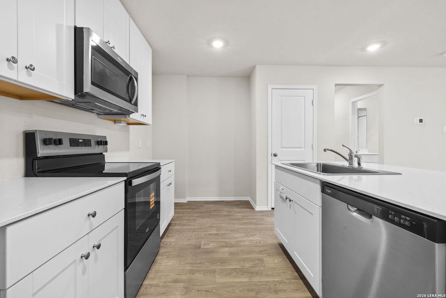 Furnished interior view inside a new home in Spring Valley, New Braunfels (Image 7). Furnished interior view inside a new home in Spring Valley, New Braunfels (Image 7).