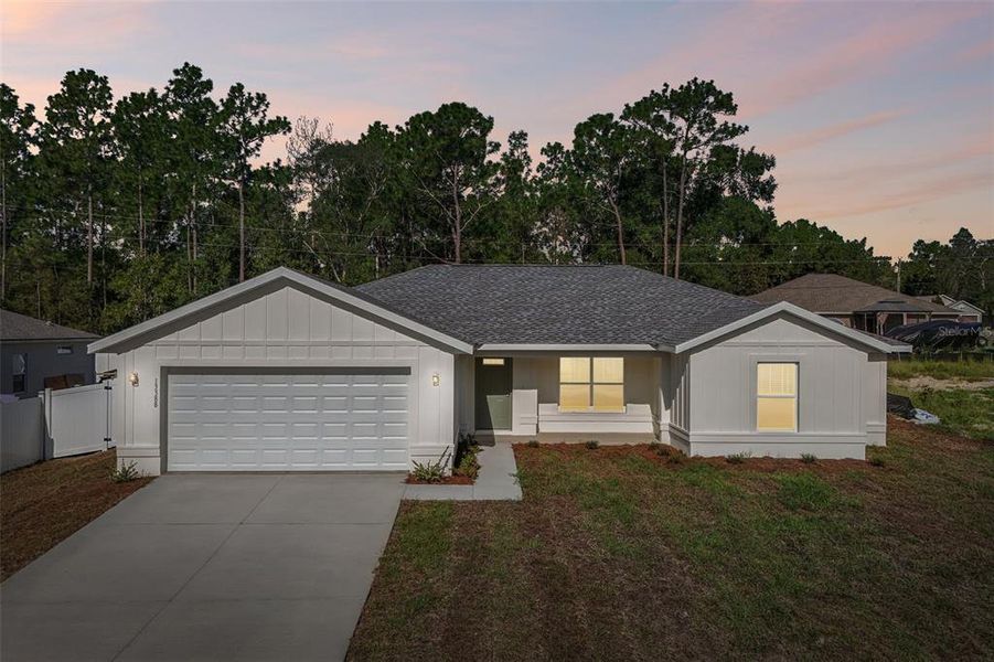 Front exterior of a new home in , Ocala, FL, highlighting curb appeal (Image 21). Front exterior of a new home in , Ocala, FL, highlighting curb appeal (Image 21).