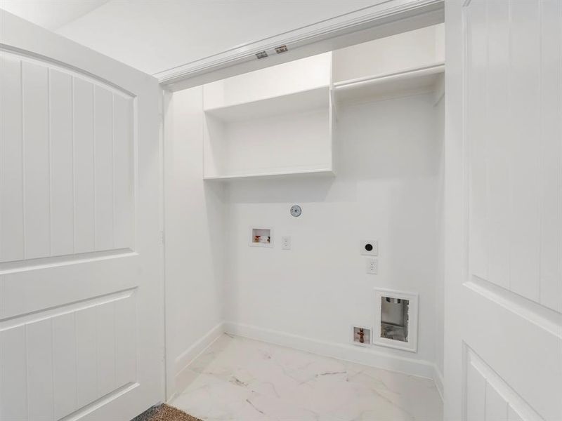 The Upstairs Utility Room is located in the Gameroom for easy access to all the bedrooms. (Sample photos of a completed Warwick floor plan. The image may feature alternative selections and/or upgrades.)