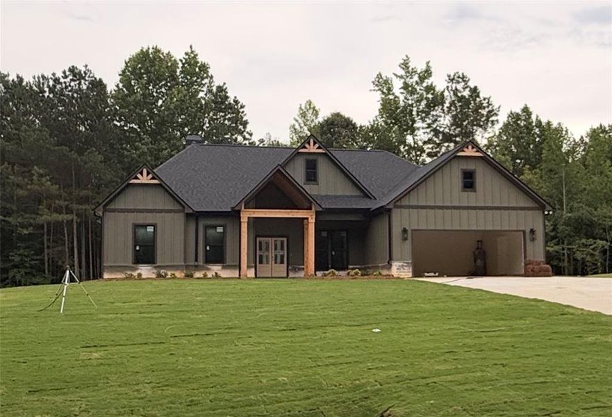 Front exterior of a new home in , Dallas, GA, highlighting curb appeal (Image 9).