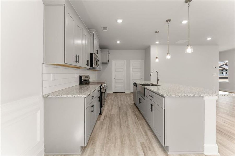 Furnished interior view inside a new home in Magnolia Villas, Cornelia (Image 7).