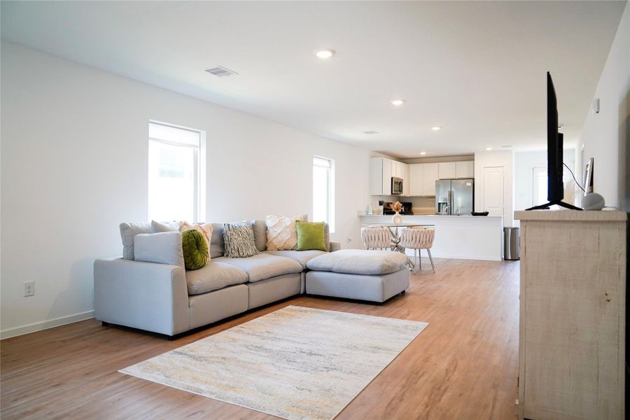 Furnished interior view inside a new home in Sunterra, Katy (Image 25).