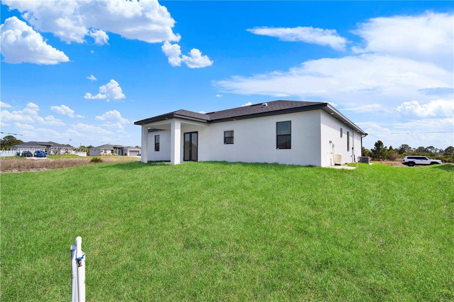 Exterior details and patio area of a home in , Lehigh Acres (Image 3).