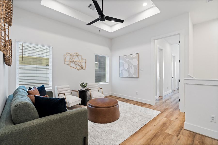 This secondary living area effectively separates the primary and secondary bedrooms, balancing privacy and functionality. It creates distinct living zones while maintaining a cohesive and comfortable environment. This secondary living area effectively separates the primary and secondary bedrooms, balancing privacy and functionality. It creates distinct living zones while maintaining a cohesive and comfortable environment.