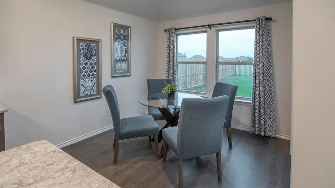 Dining room with dark wood floors