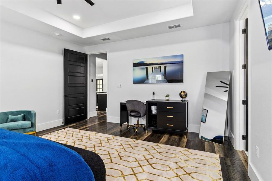 Primary bedroom #1 with ensuite bath to the right. Enough room for an office plus a sitting area!