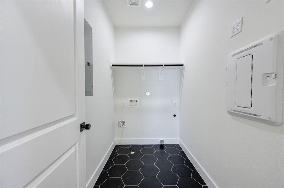 Large walk-in laundry room on the same floor as all the bedrooms