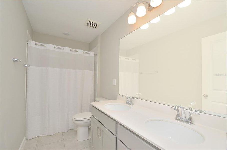 Furnished interior view inside a new home in Seasons at Eden Hills, Lake Alfred (Image 12).