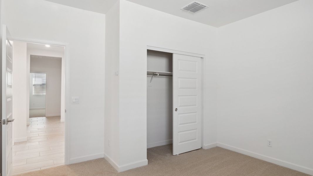 Representative unfurnished interior of a home built from the Cobalt by D.R. Horton in Zanjero Pass, Glendale (Image 25).