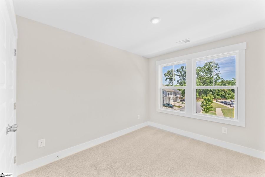 Spacious, unfurnished interior of a new home in Renaissance Place, Greenville (Image 24).