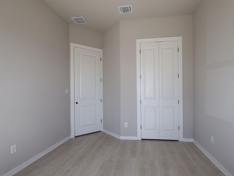 Spacious, unfurnished interior of a new home in Heritage, Dripping Springs (Image 7).