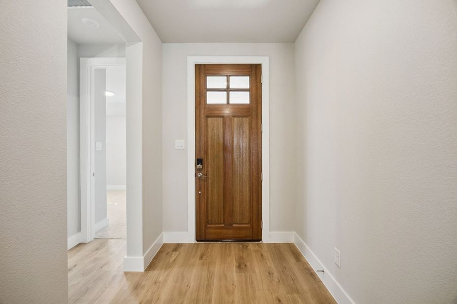 Representative unfurnished interior of a home built from the Adolphus by Centre Living Homes in Painted Tree Woodland West, McKinney (Image 17).