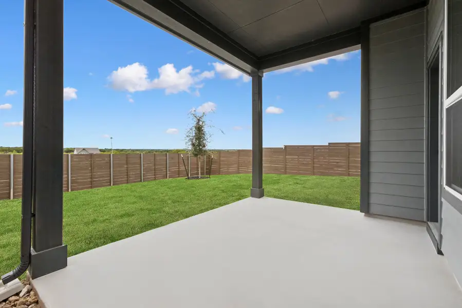 Exterior details and patio area of a home in Double Creek Crossing – Classic Series, Round Rock (Image 4).