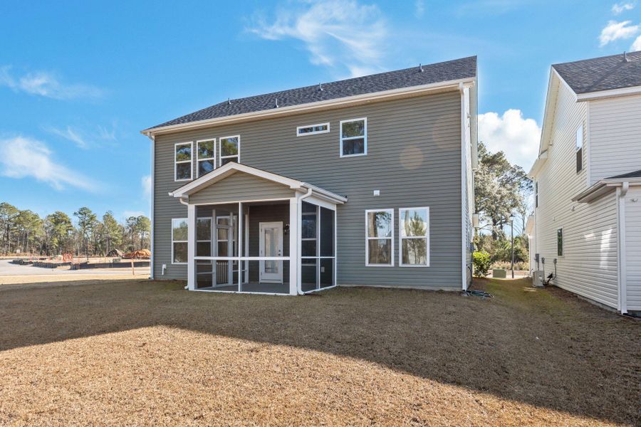 Exterior details and patio area of a home in The Groves of Berkeley, Moncks Corner (Image 31).