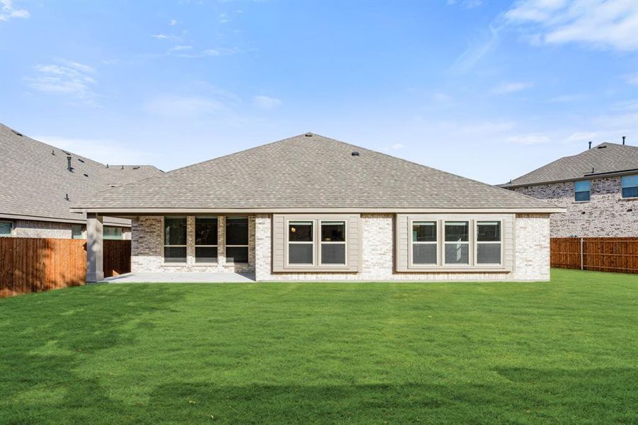 Exterior details and patio area of a home in The Enclave at Parks of Aledo, Aledo (Image 25).