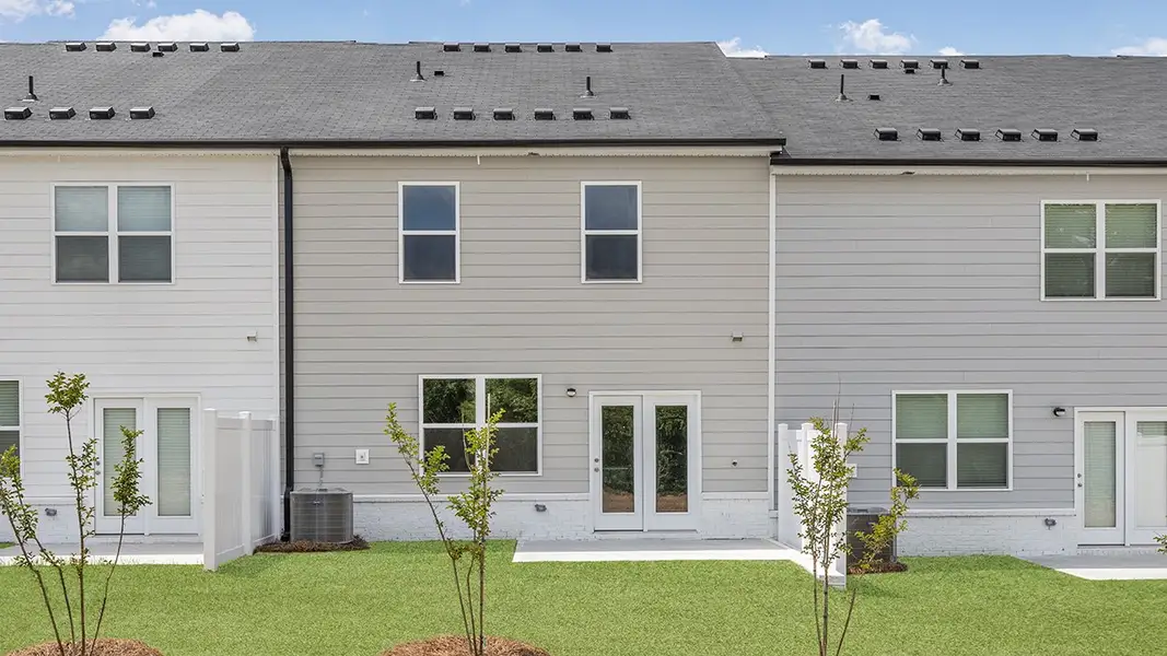 Exterior details and patio area of a home in Echo Glen, Stockbridge (Image 2).